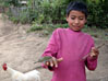 Akha boy with bird